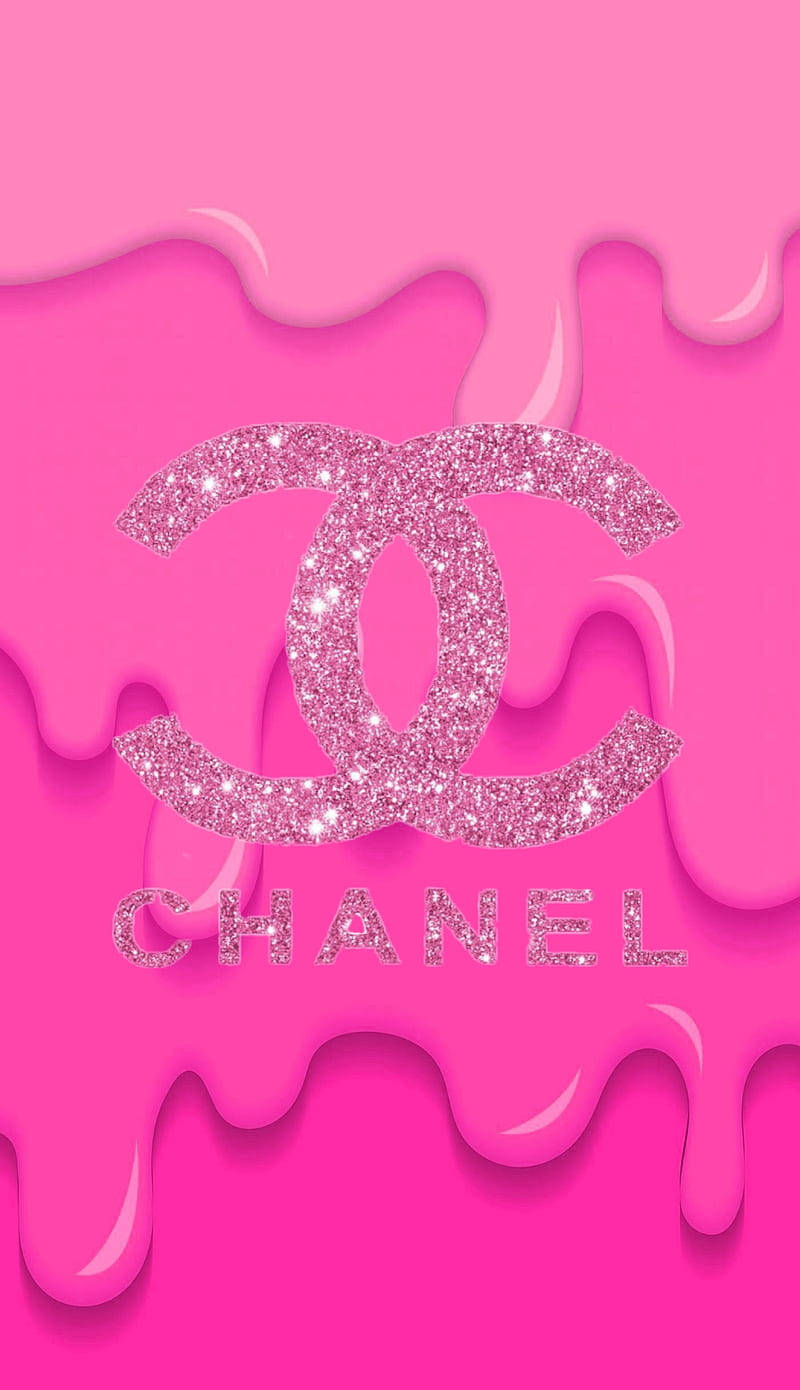 Pink Chanel Logo Against Black Background Wallpaper