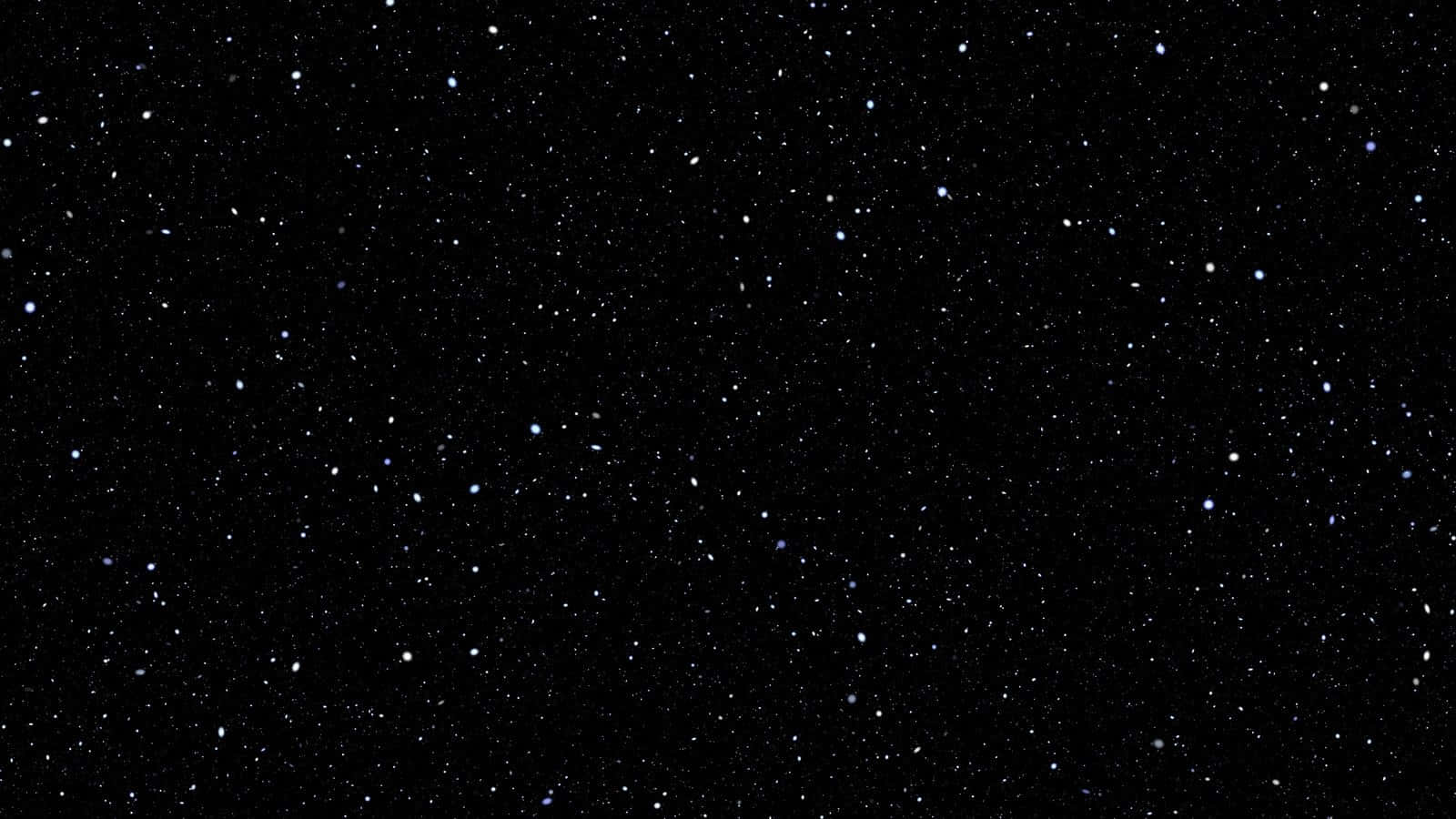 Plain Black Desktop With Twinkling Stars Wallpaper