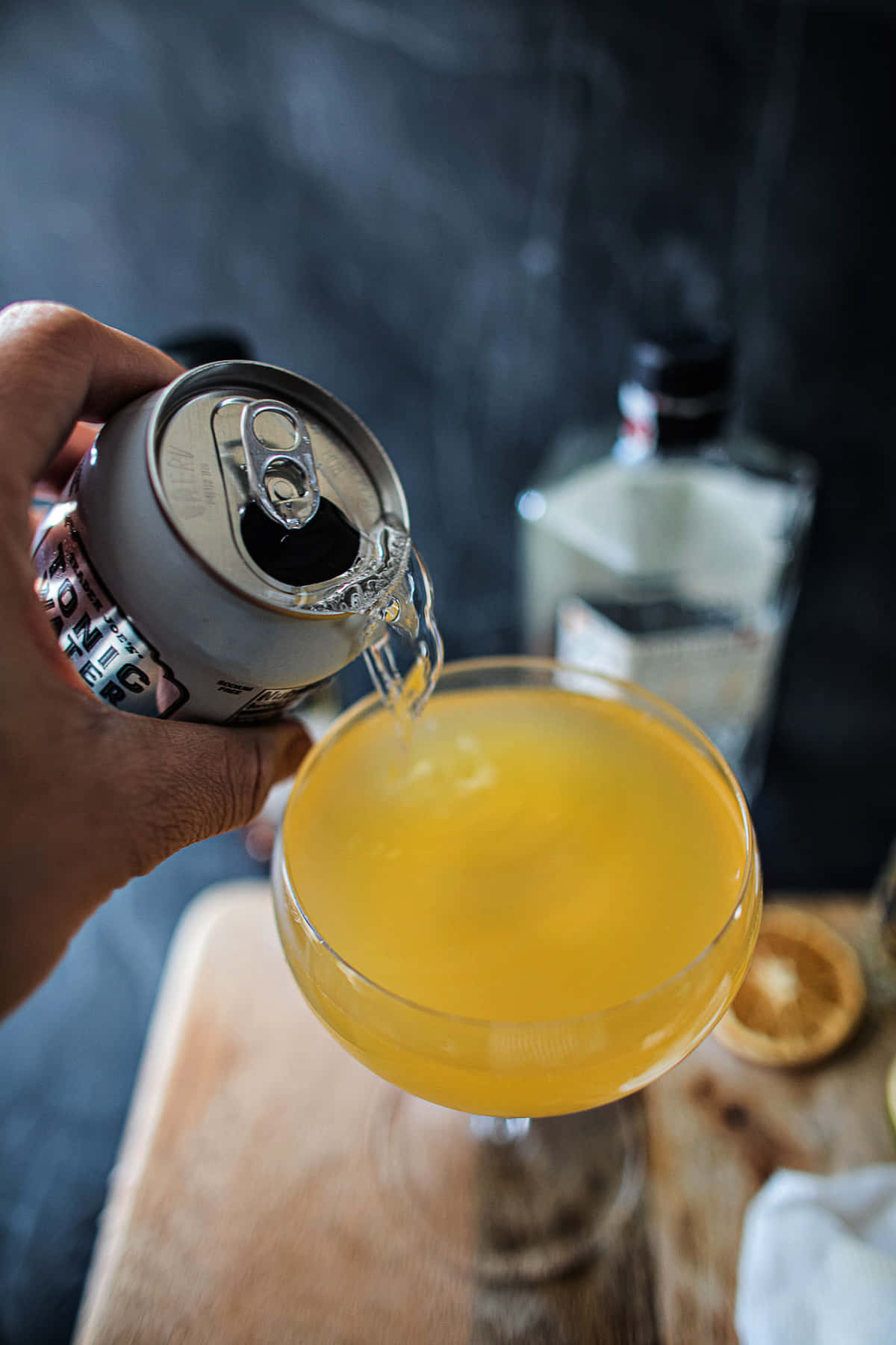 Pouring Orange Drink From Can Wallpaper