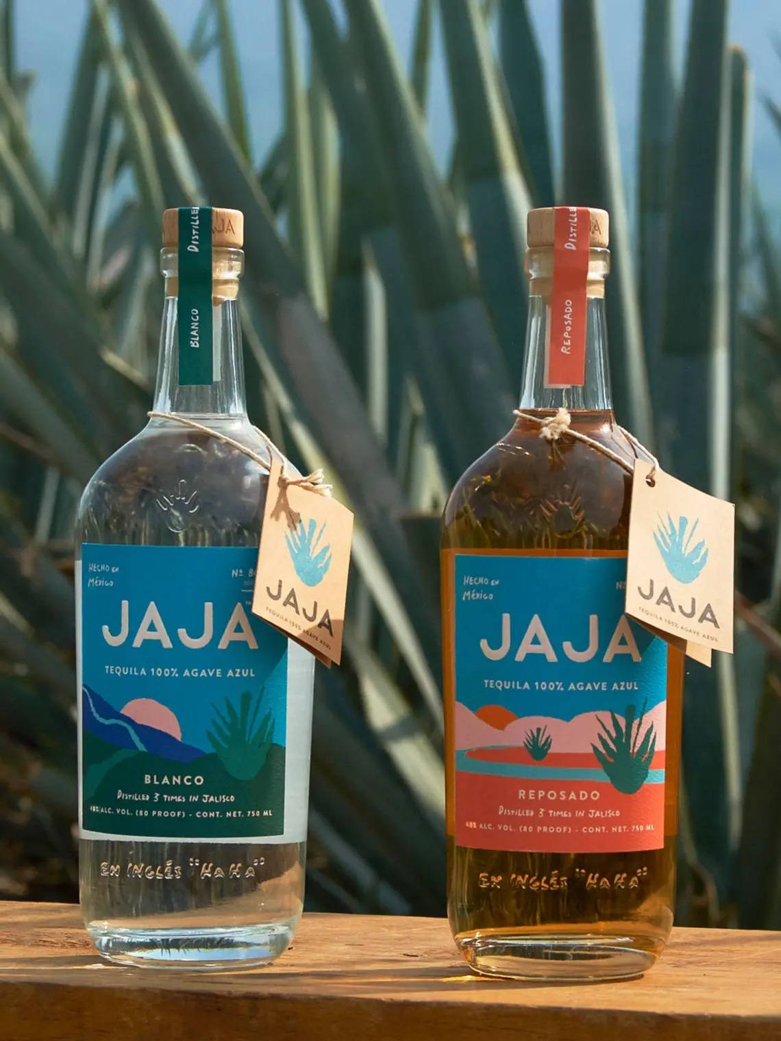 Premium Jaja Tequila Blanco And Reposado Bottles Wallpaper