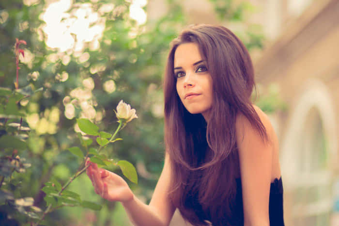 Pretty Teen Girl In Garden Wallpaper