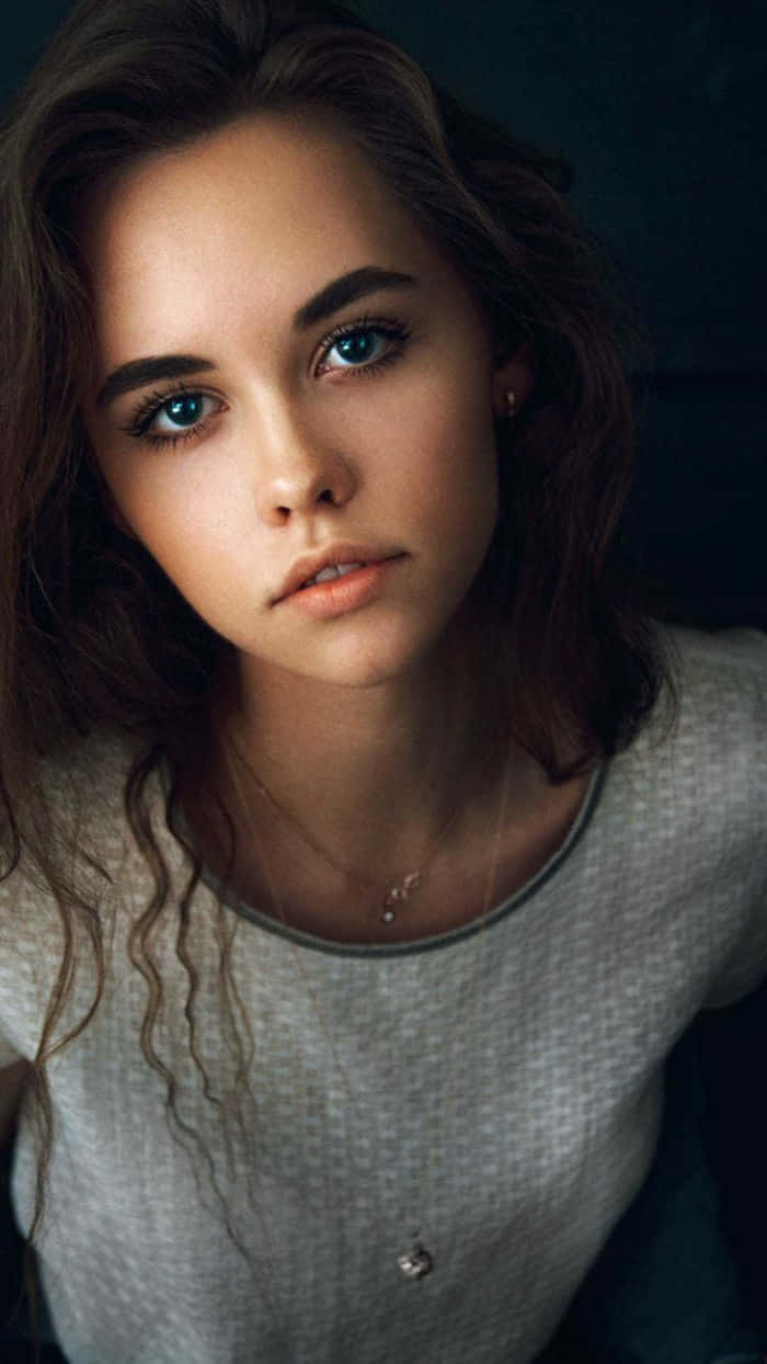 Pretty Teen Serious Girl Wallpaper