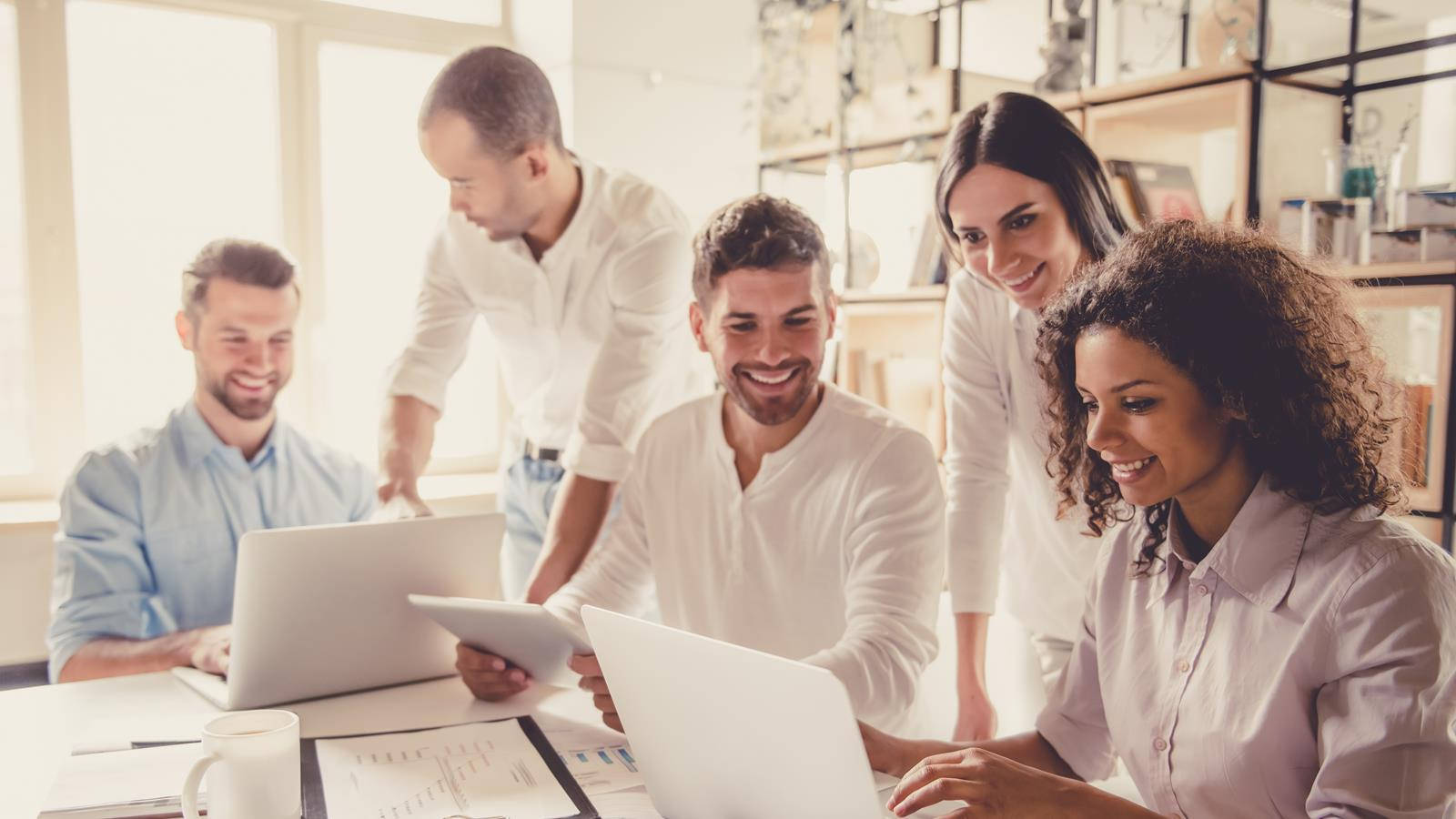 Professional Actuary Team In Business Office Setting Wallpaper