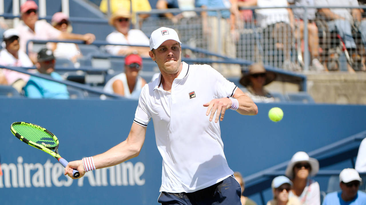 Professional Tennis Player, Sam Querrey, Masterfully Executing A Serve Wallpaper