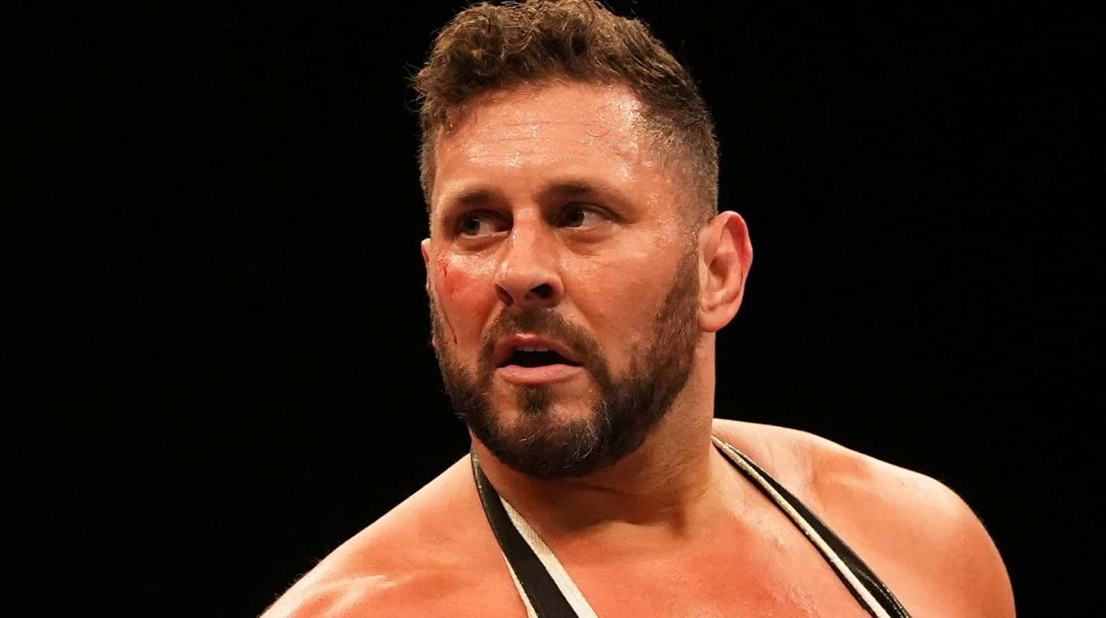 Professional Wrestler In Ring Action Wallpaper