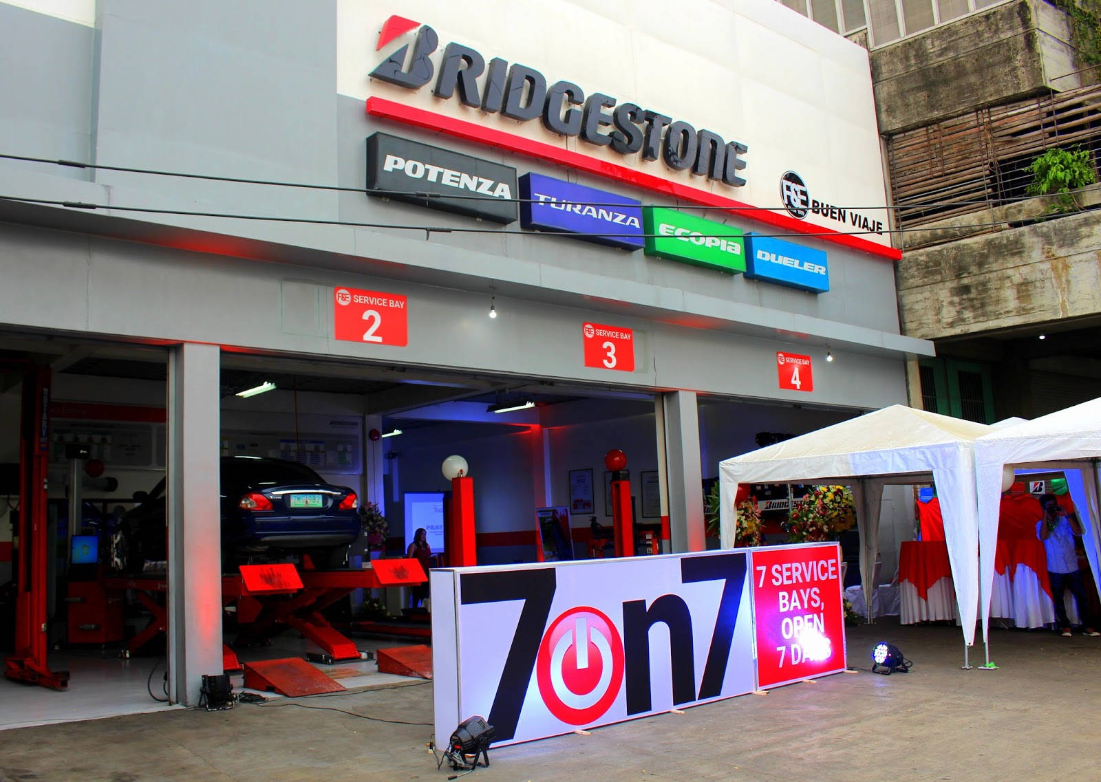 Prominent Bridgestone Tire Store Display Wallpaper