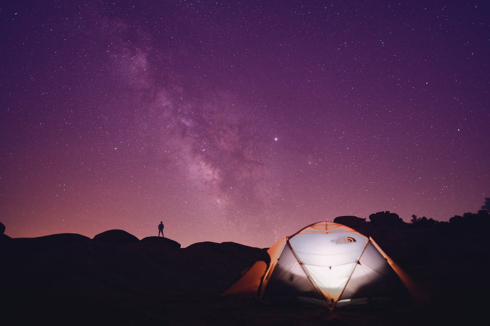 Purple Galaxy Man And Tent Wallpaper