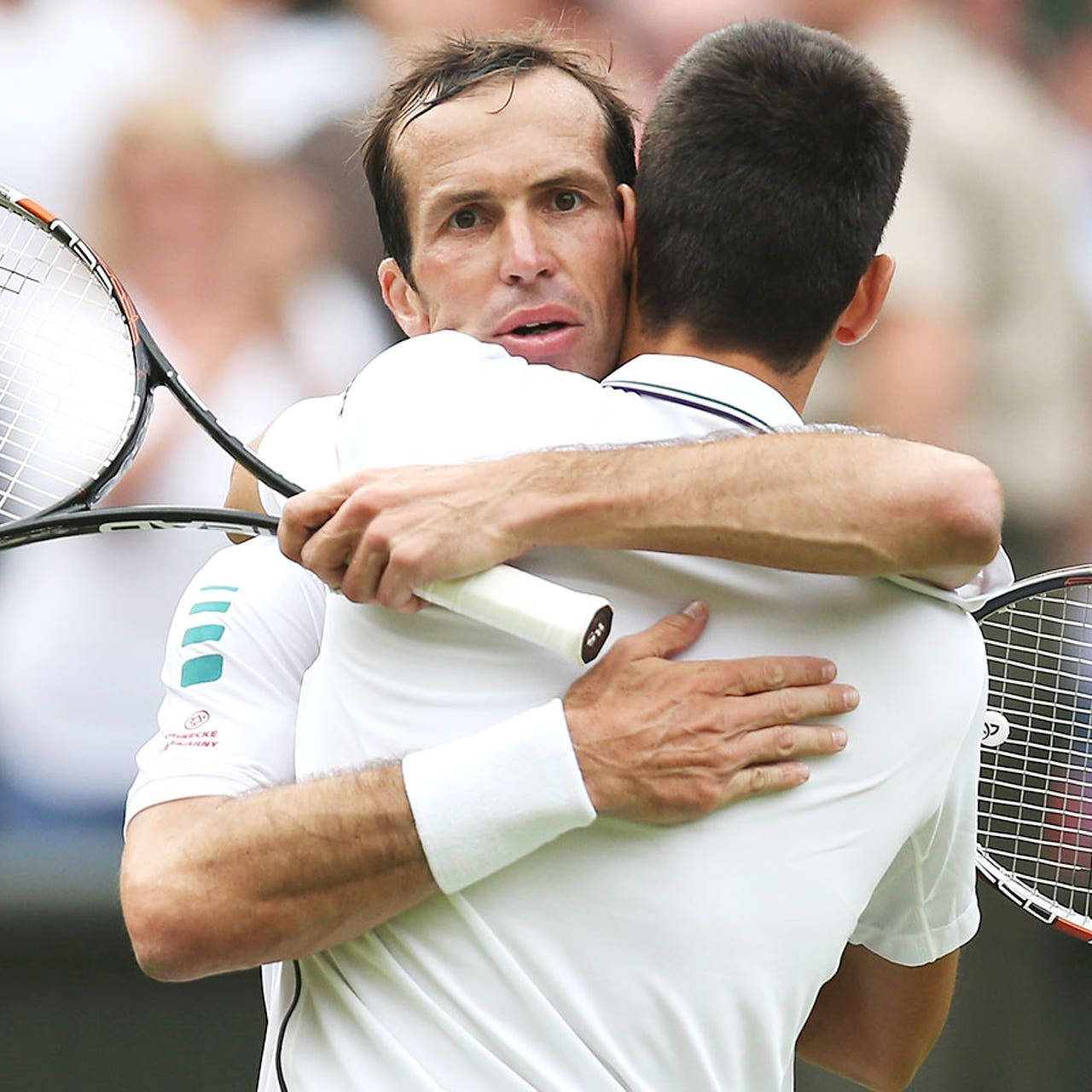 Radek Stepanek Hugging Novak Djokovic Wallpaper