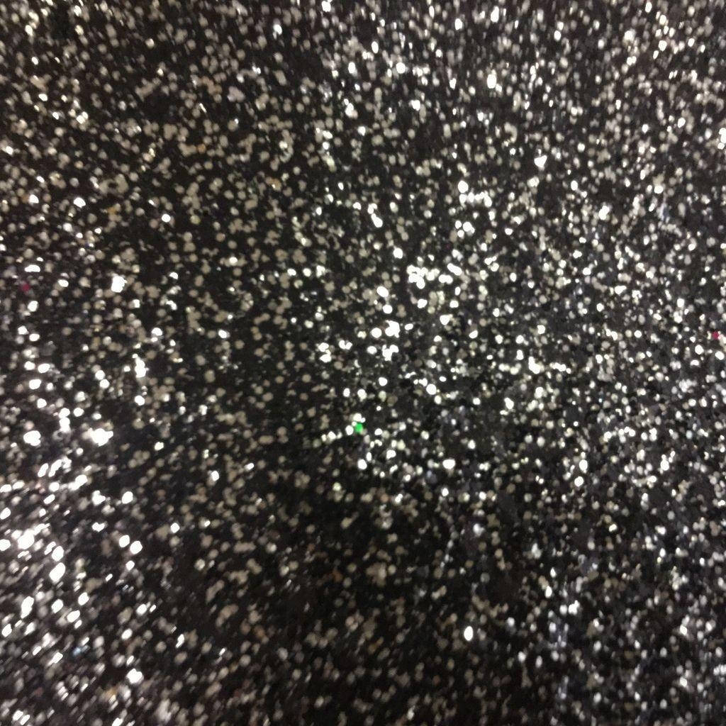 Radiant Midnight Sheen - The Charm Of Black Glitter Wallpaper