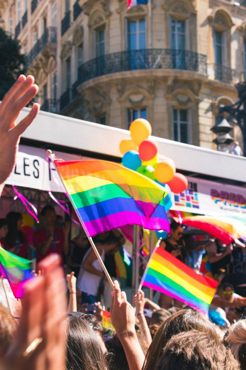 Rainbow Flag In The Air For A Black Gay Man Life Wallpaper