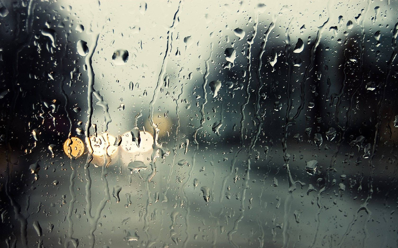 Raindrops Dripping On A Glass Wallpaper