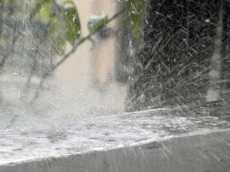 Raining And Splashing Off A Wall Wallpaper