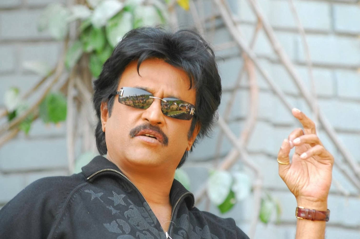 Rajinikanth Flicking Fingers Wallpaper