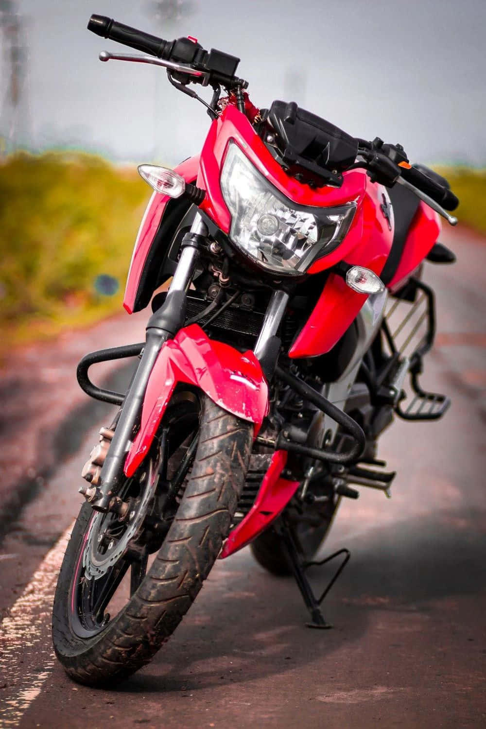 Red Motorcycle Parked Outdoors Wallpaper