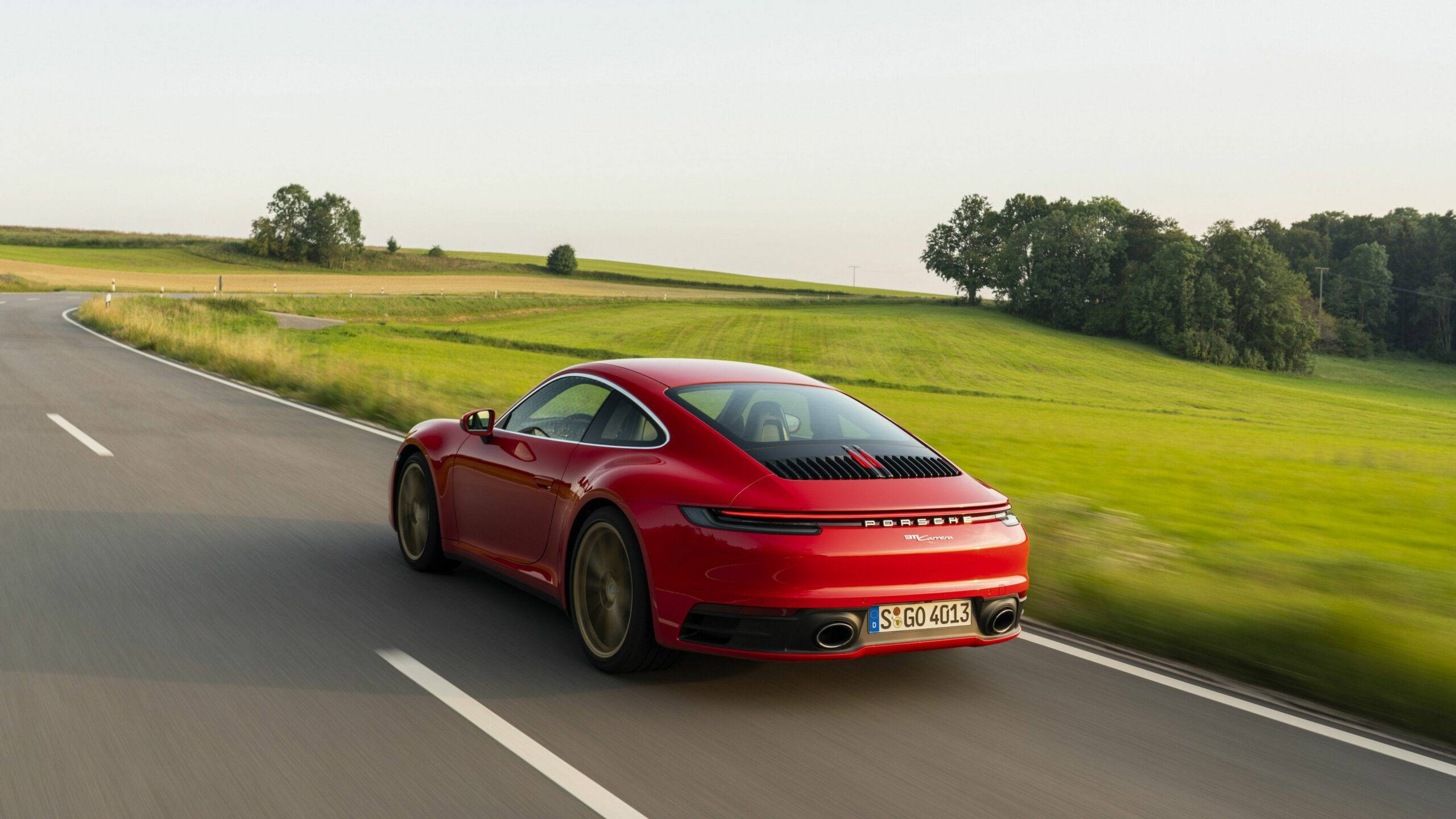 Red Porsche 911 In Countryside Wallpaper