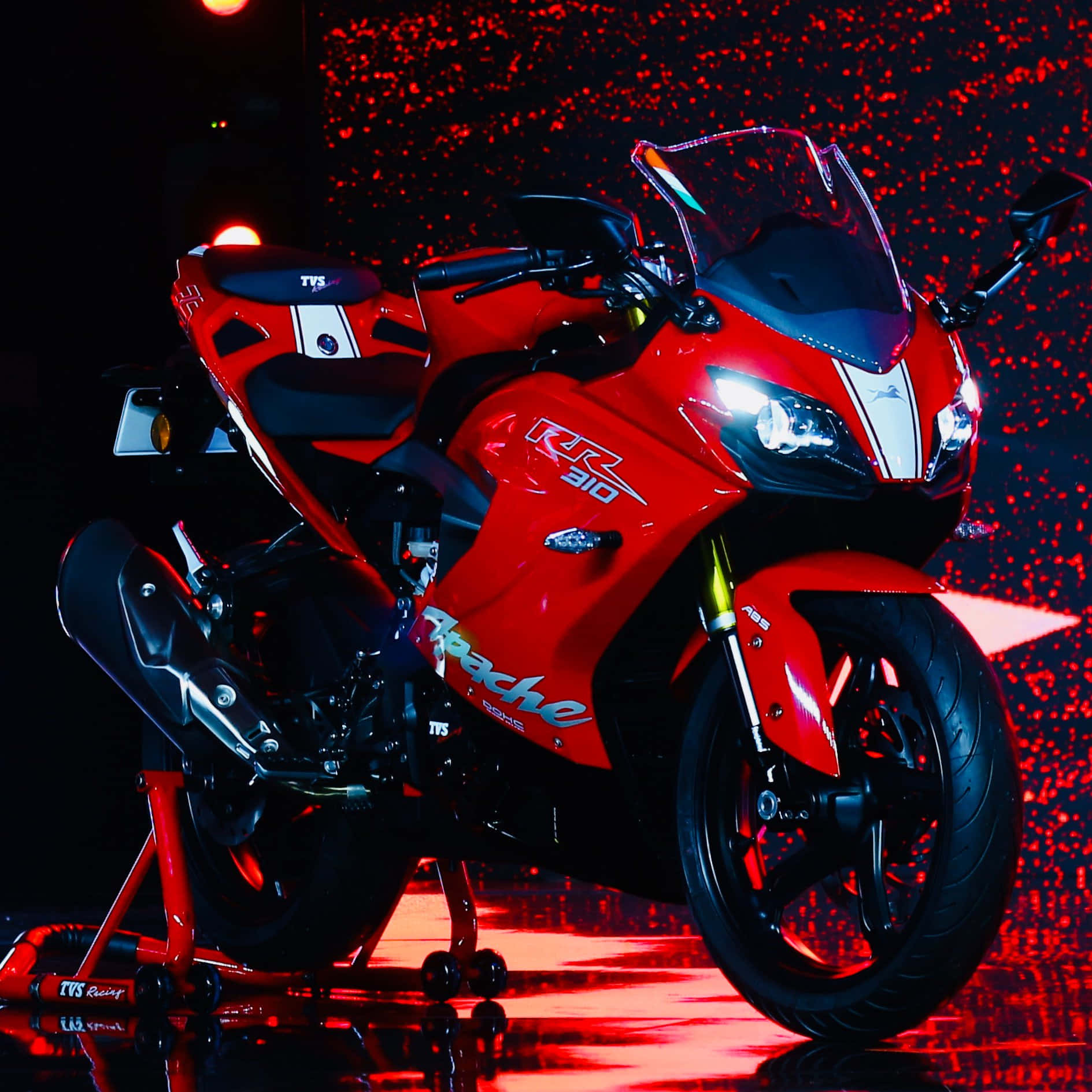 Red Sports Bike Under Spotlight Wallpaper