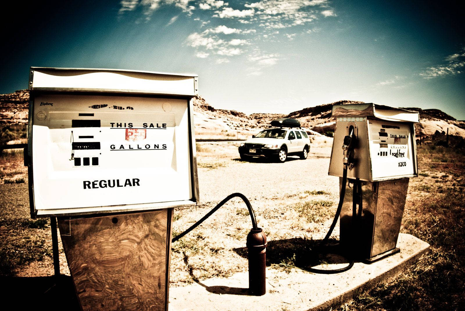 Retro Gas Station Against A Dusk Sky Wallpaper