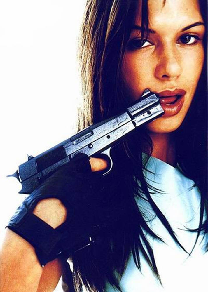 Rhona Mitra With Gun Wallpaper