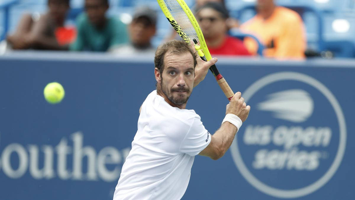 Richard Gasquet In Action, Ready To Hit The Tennis Ball. Wallpaper