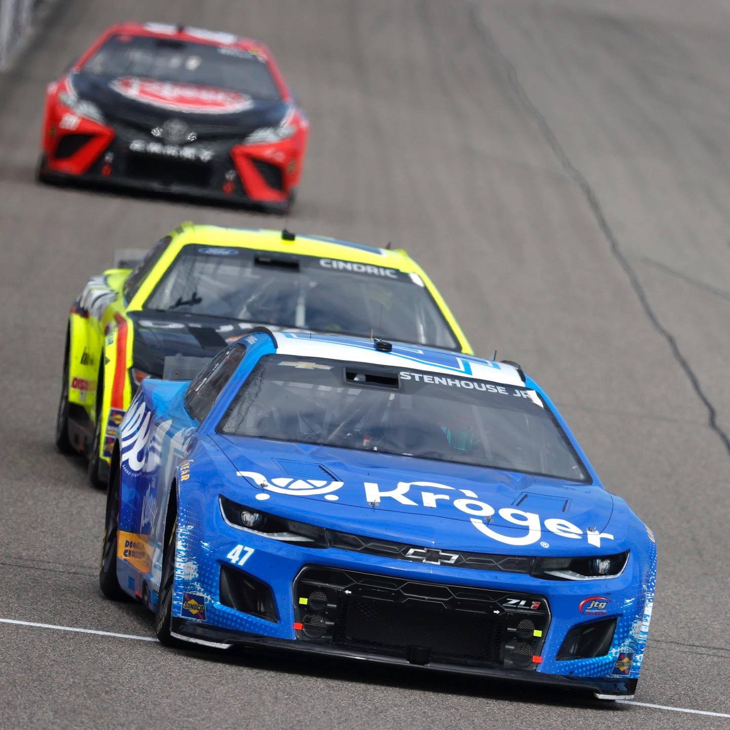 Ricky Stenhouse Jr Leading The Race In His Signature Car Wallpaper