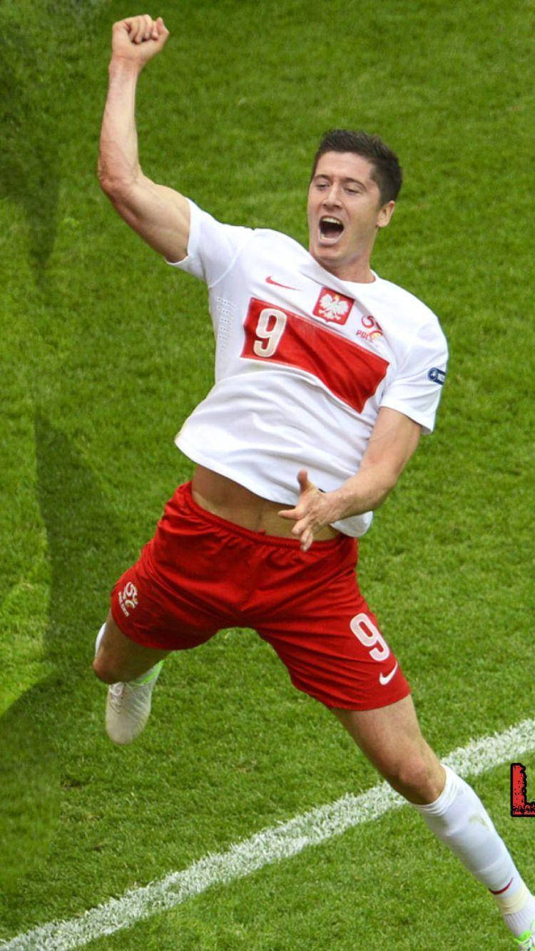 Robert Lewandowski Jumping Happily Wallpaper