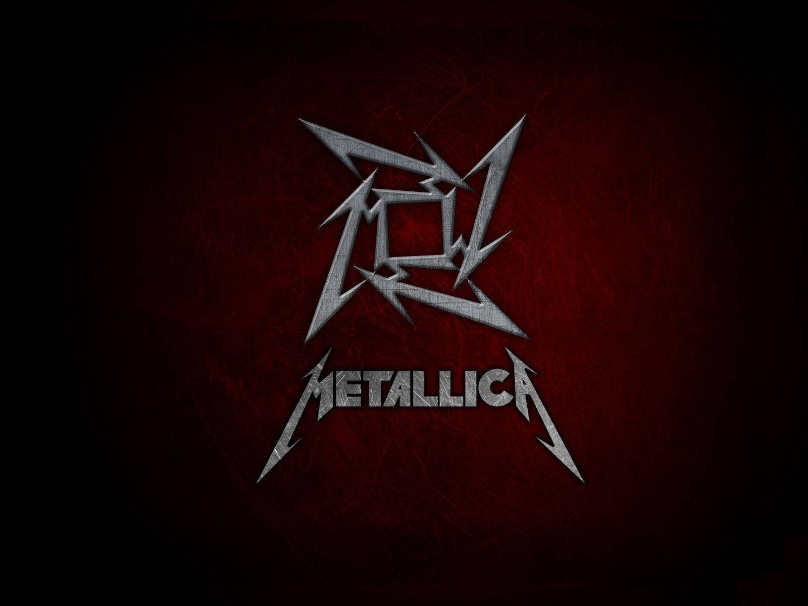 “rock Out With Metallica’s Iconic Ninja Star Emblem” Wallpaper