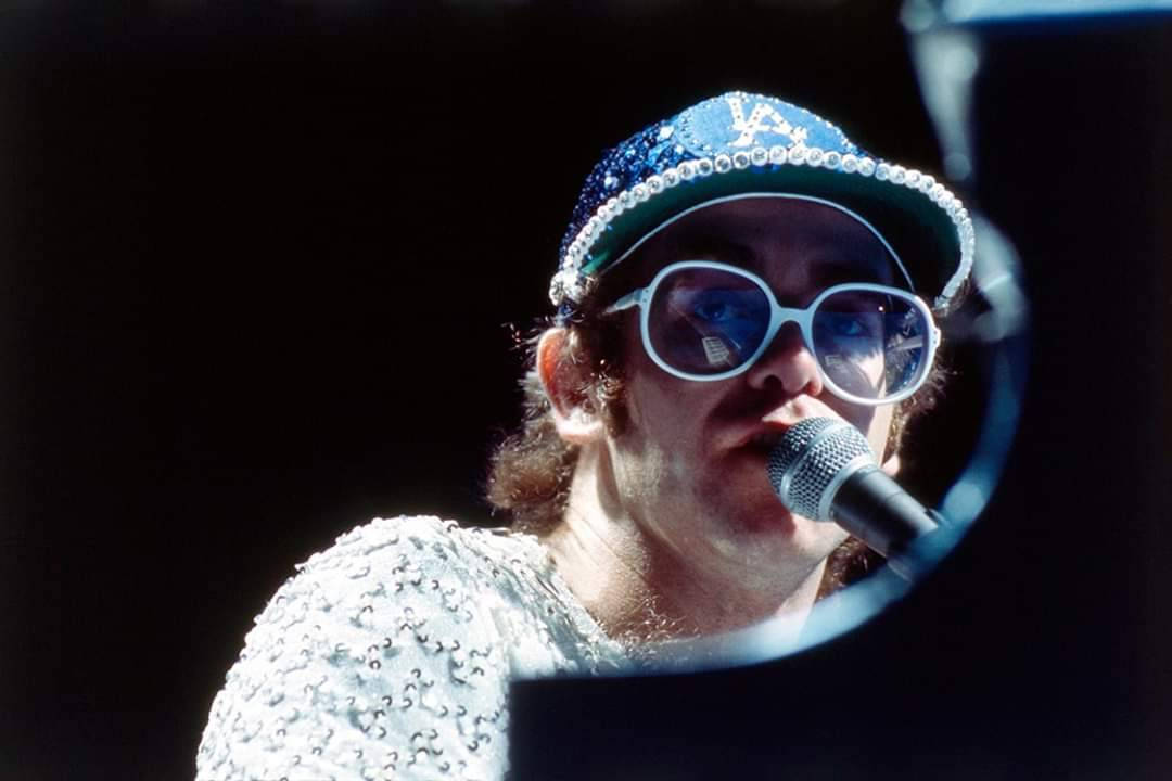 Rocketman Blue Cap White Glasses Wallpaper