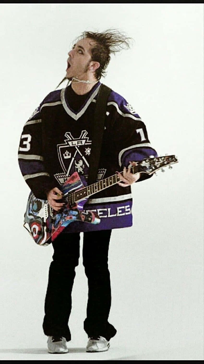 Rocking Guitaristin Hockey Jersey Wallpaper