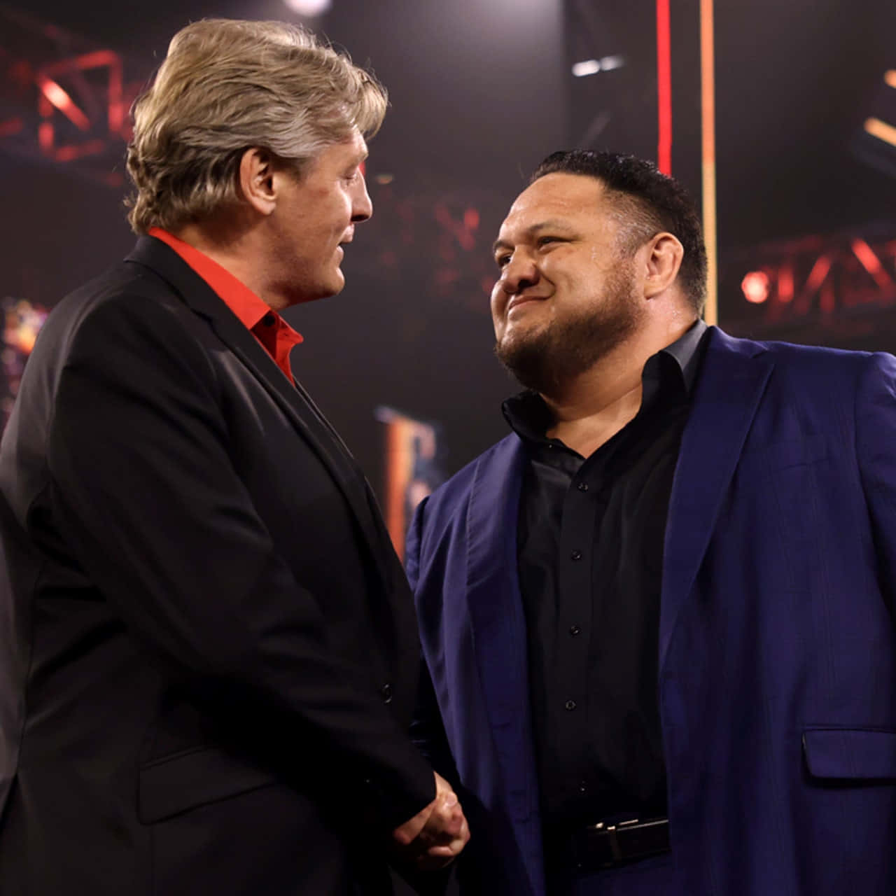 Samoa Joe Smiling To William Regal Wwe Wallpaper