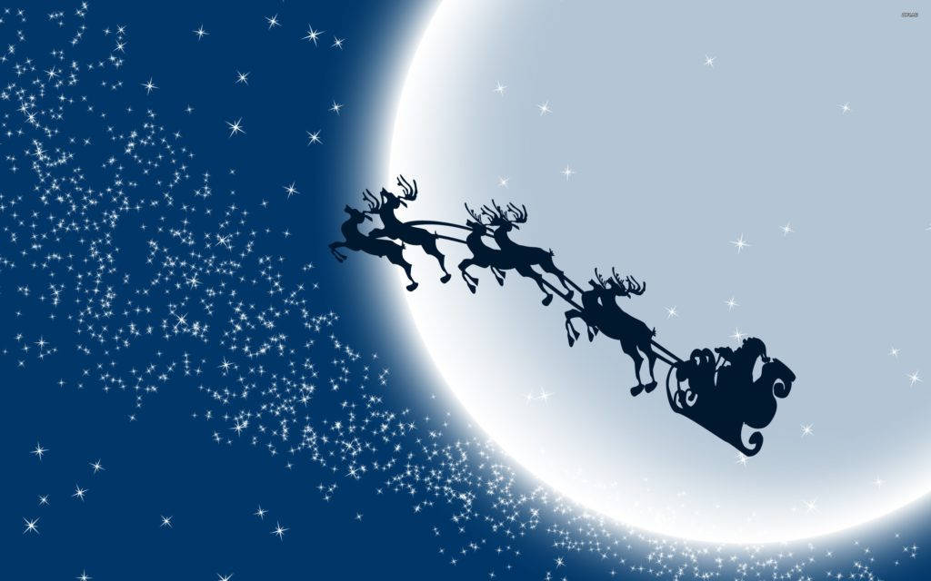 Santa On Reindeer Sleigh Wallpaper