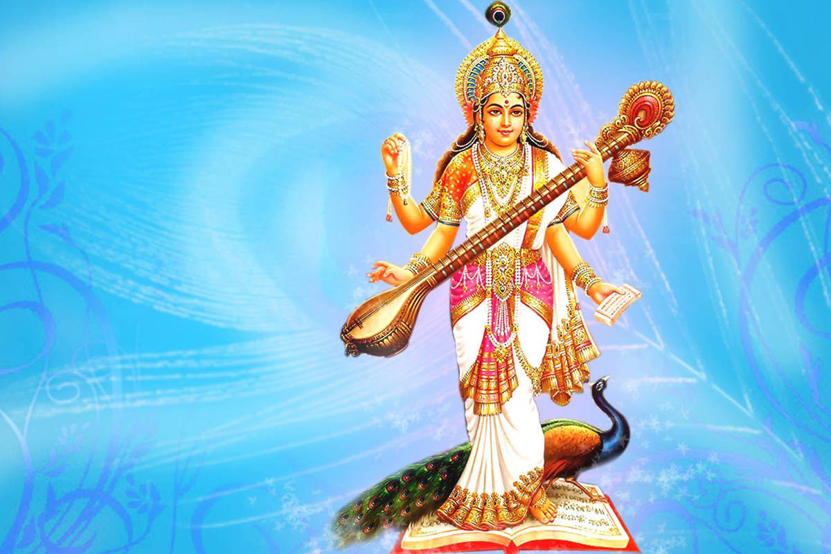 Saraswati Mata With Peacock Wallpaper