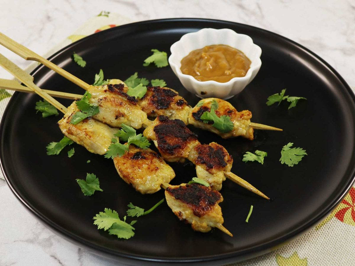 Savory Chicken Satay With Peanut Sauce And Fresh Coriander Wallpaper