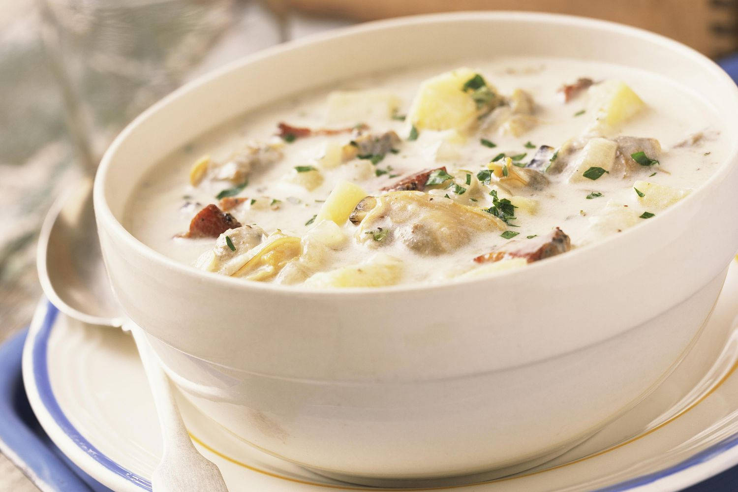 Savory New England Clam Chowder Served In A Bowl Wallpaper