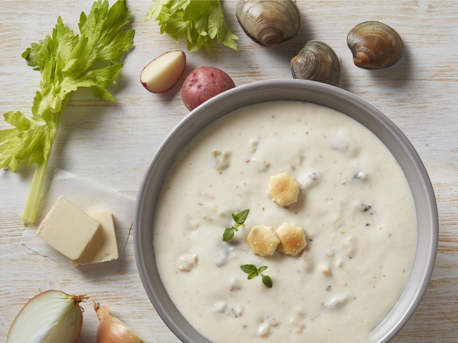 Savory New England Clam Chowder With Crackers Wallpaper