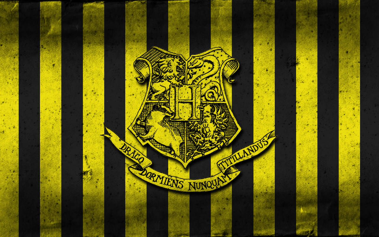 Show Your Pride For Hufflepuff With The Black And Yellow Crest Wallpaper