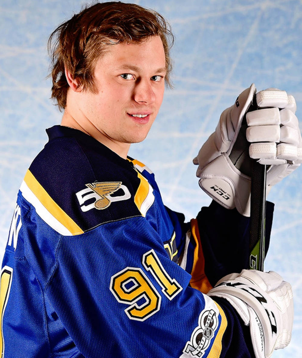 Side Portrait Of Vladimir Tarasenko While Holding Hockey Stick Wallpaper