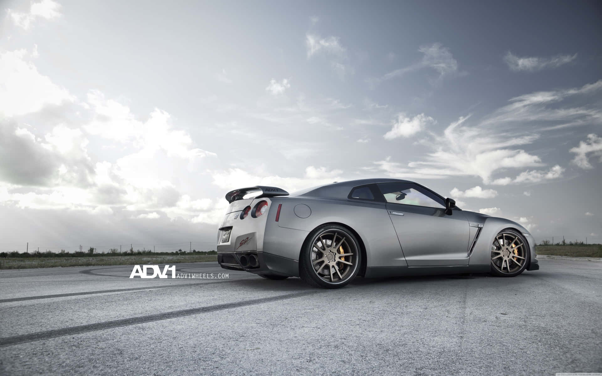 Silver Gt-r Desktop On Airplane Runway Wallpaper