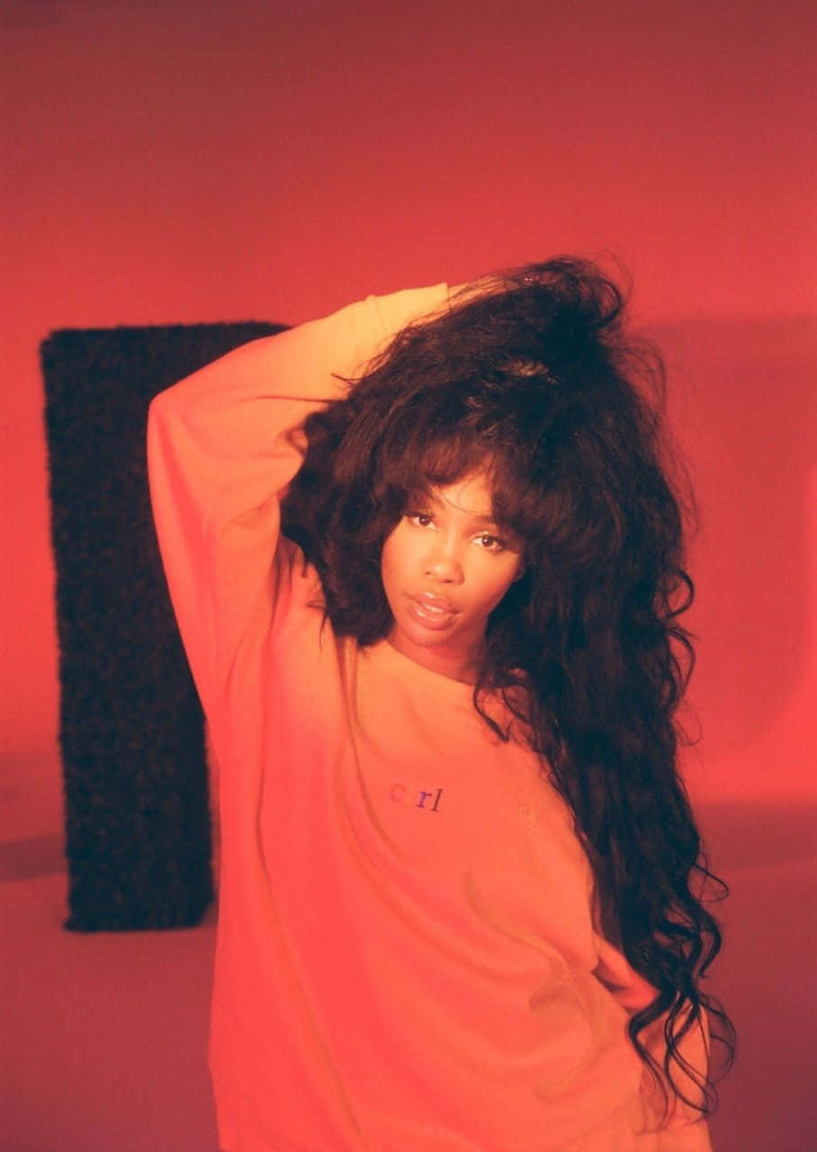 Singer And Record Producer Sza Looking Confident And Powerful Wallpaper