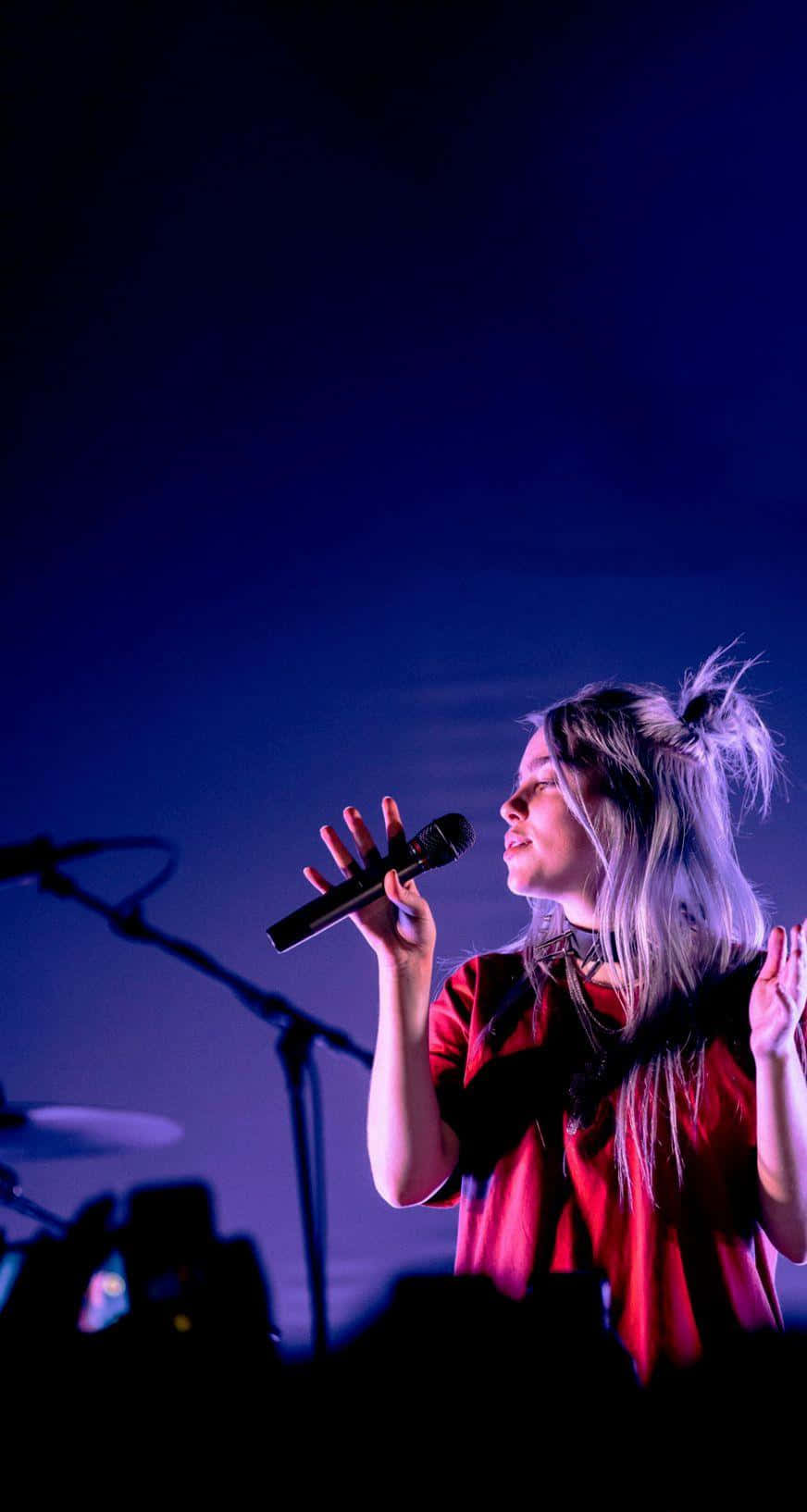 Singing Billie Eilish Purple Stage Lights Wallpaper