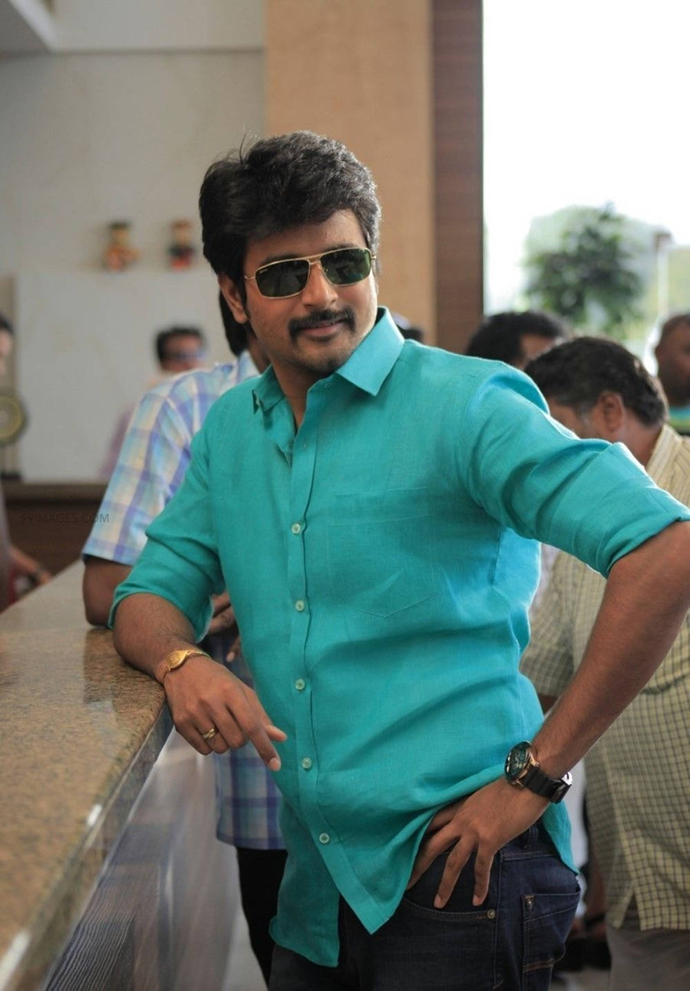 Sivakarthikeyan Teal Shirt And Sunglasses Wallpaper