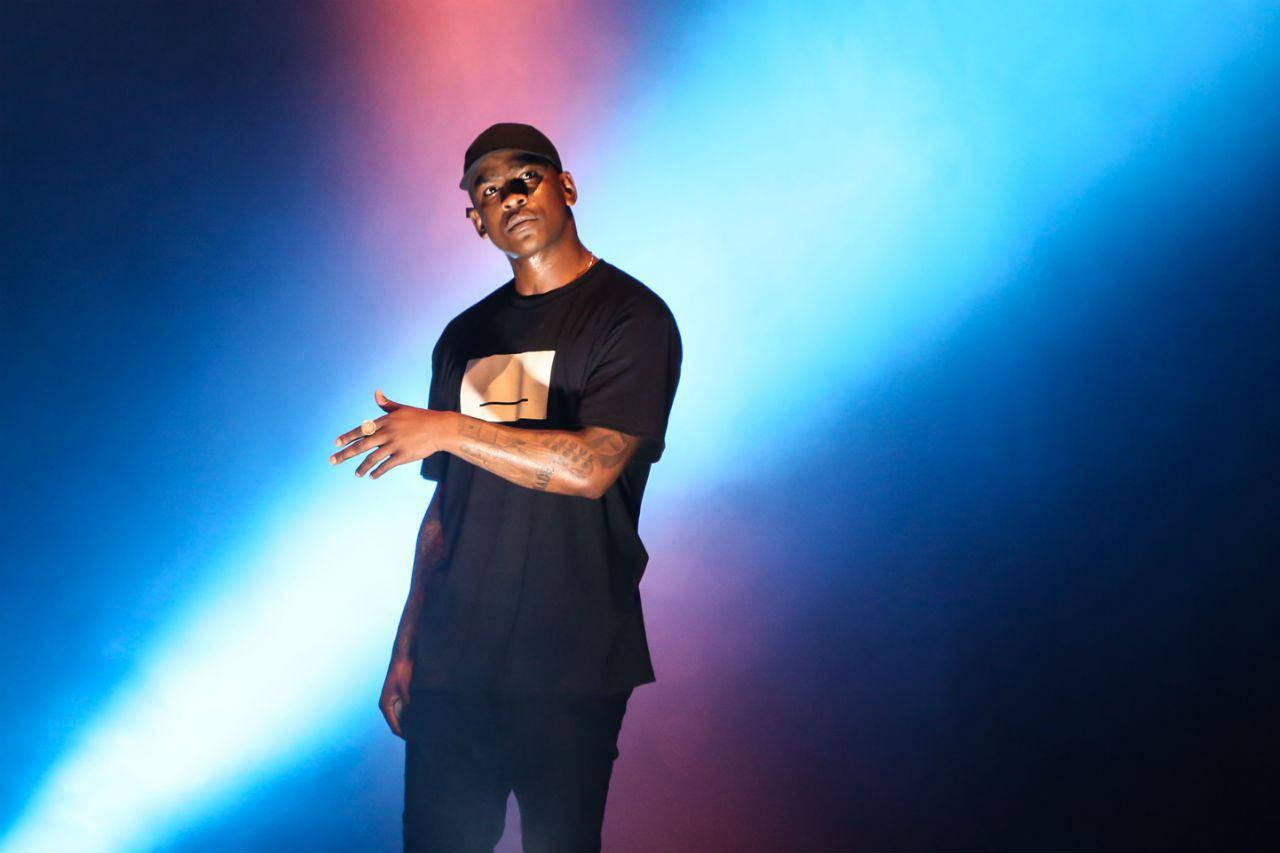 Skepta On Blue Spotlight Wallpaper