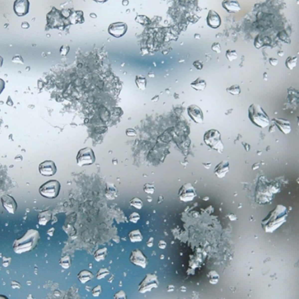 Sleet Flakes On A Glass Wallpaper