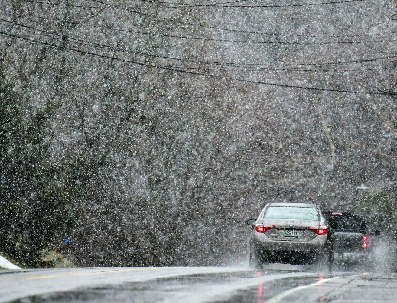 Sleet Raining Down On A Road Wallpaper