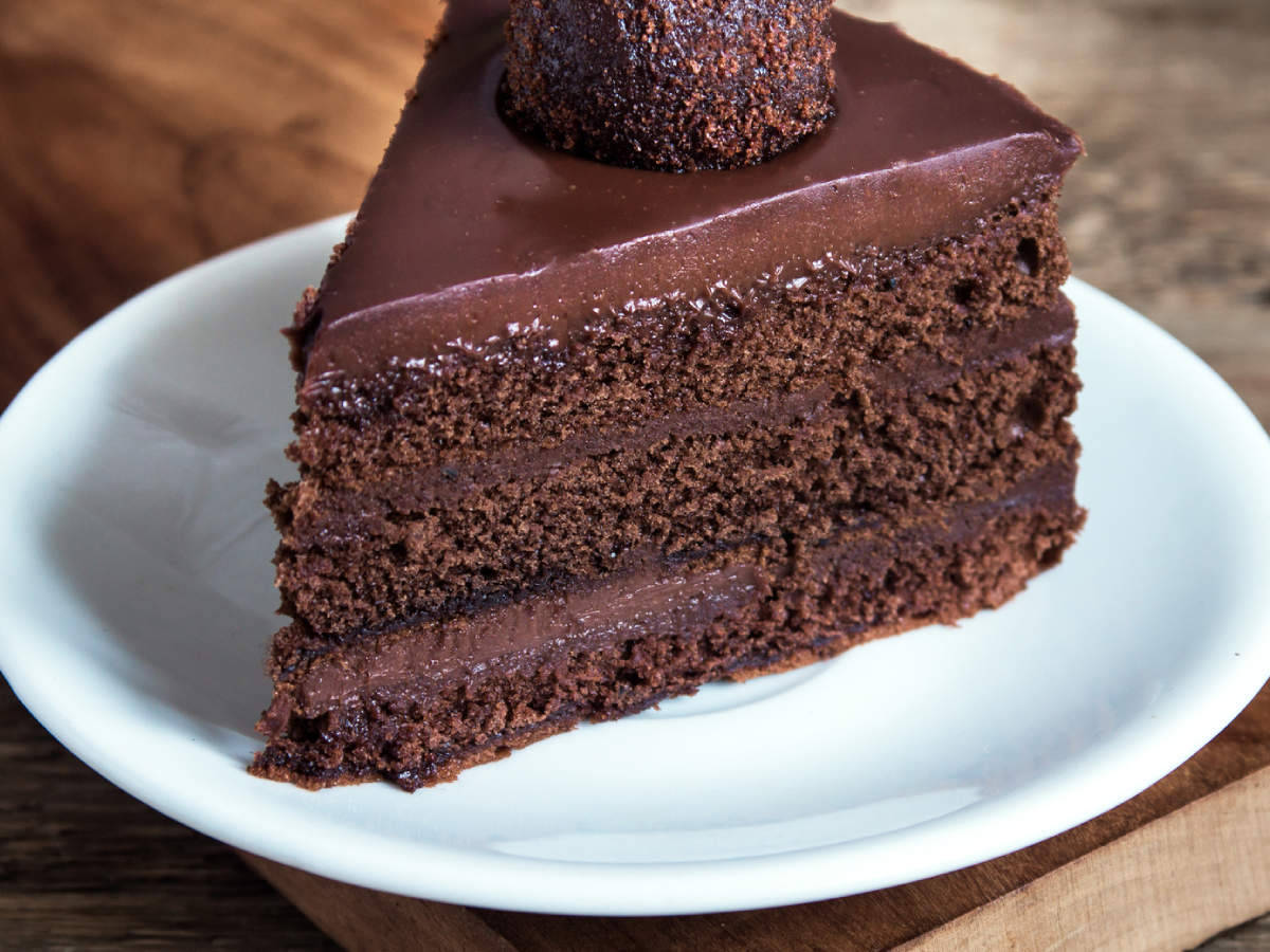 Slice Of Three Layer Chocolate Cake Wallpaper