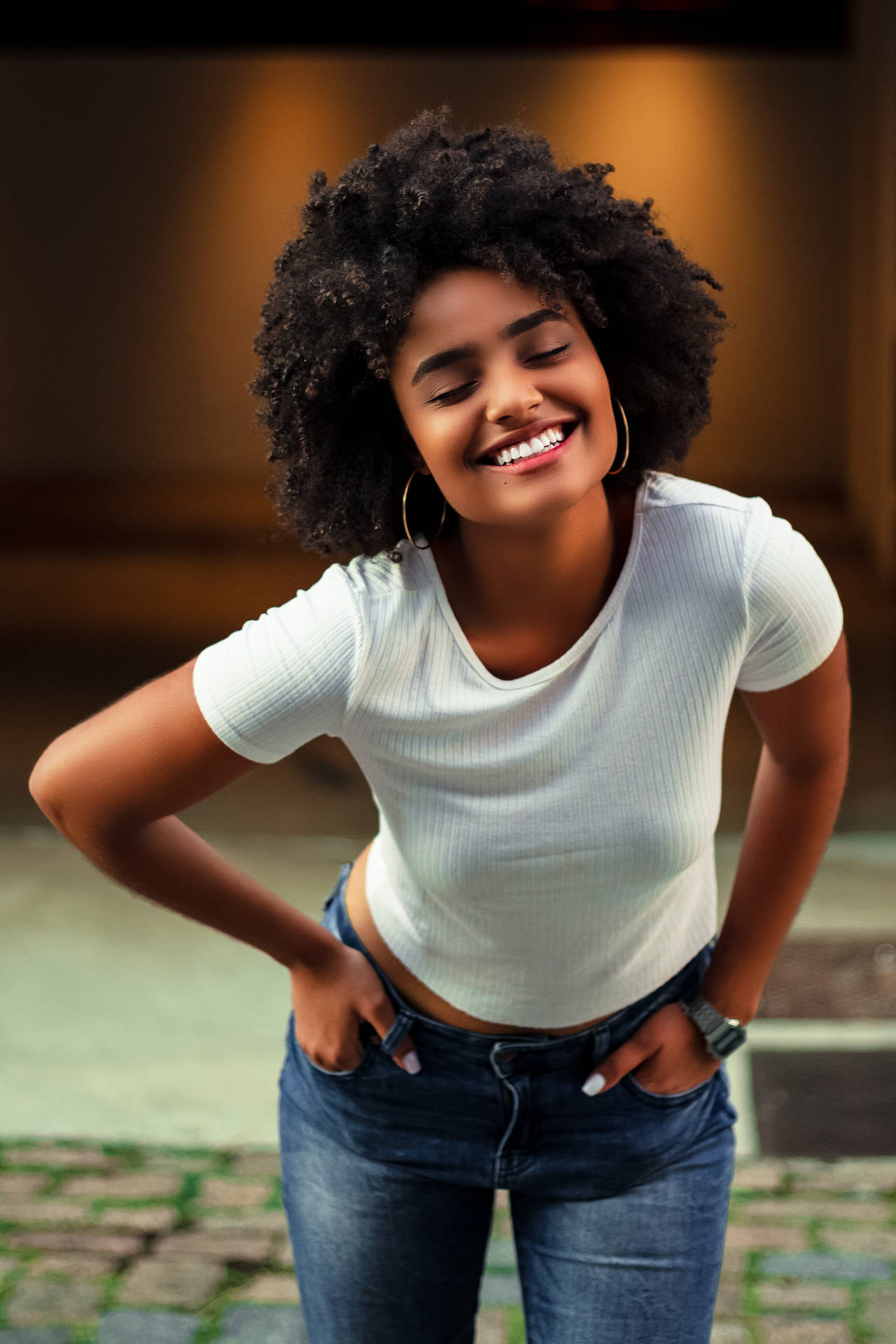 Smiling Black Woman In Afro Hairstyle Wallpaper