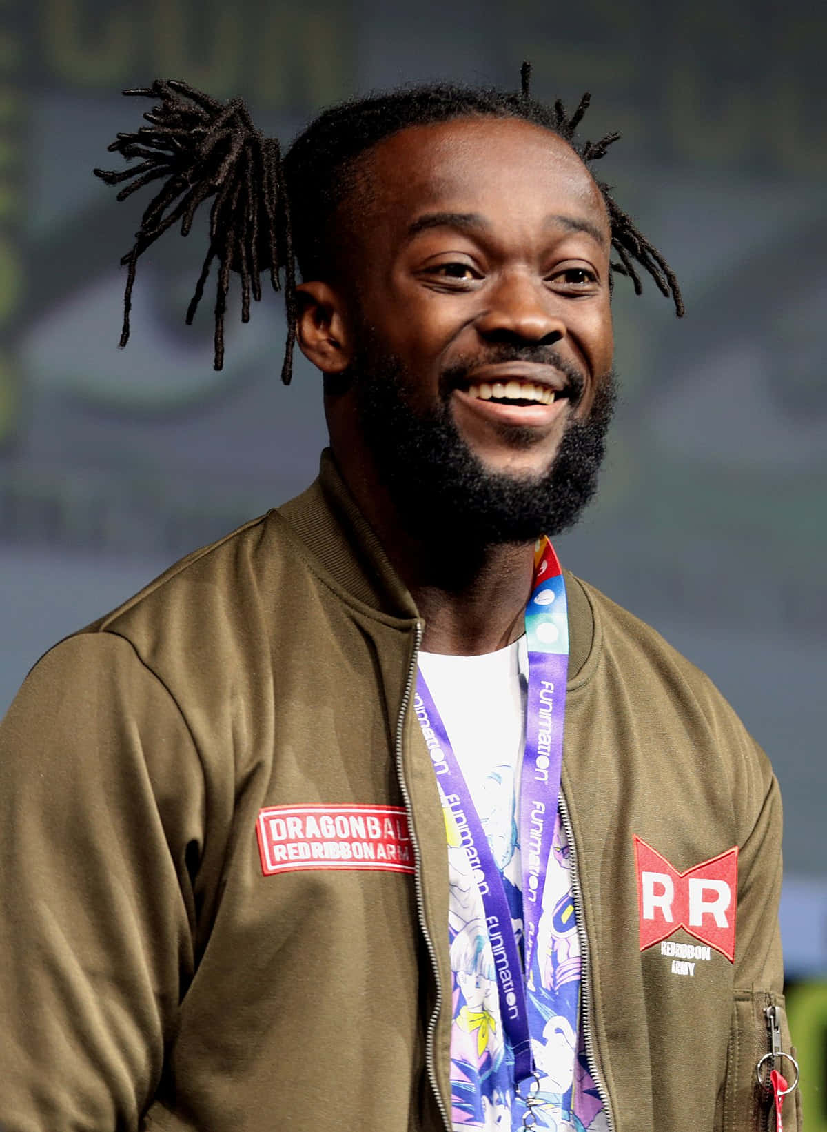 Smiling Kofi Kingston During An Exclusive Interview. Wallpaper