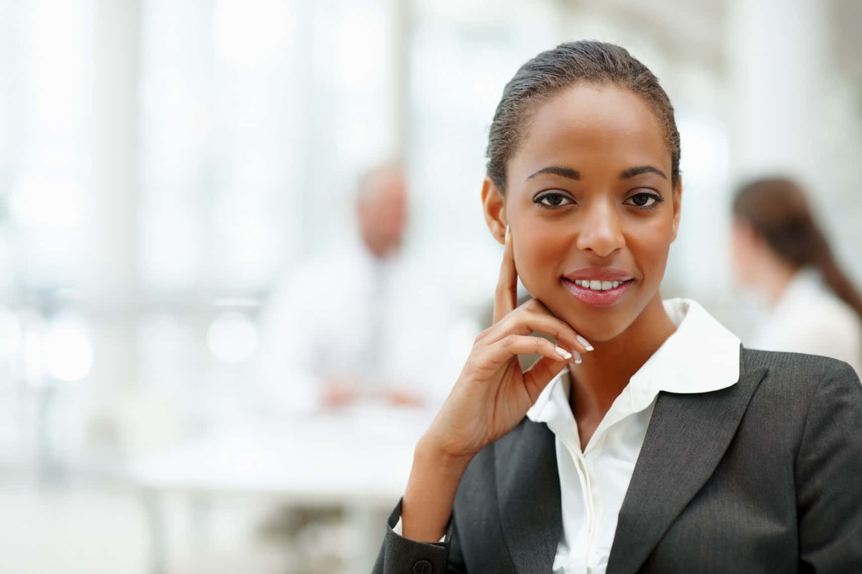 Smiling South African Woman In Formal Attire Wallpaper