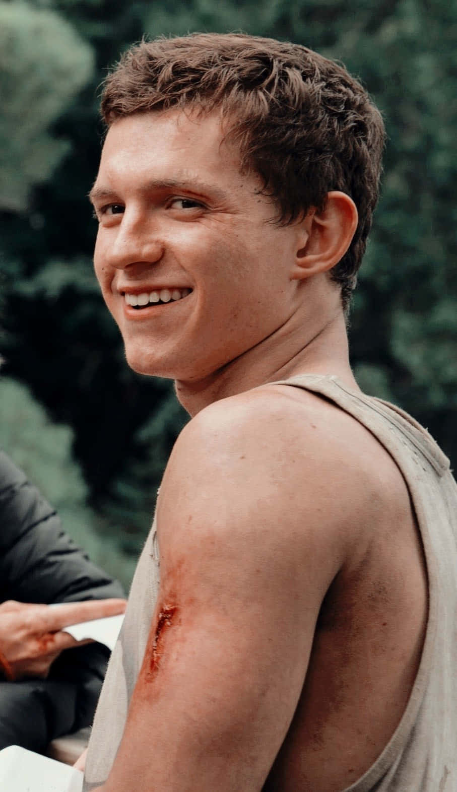 Smiling Tom Holland Aesthetic Wallpaper