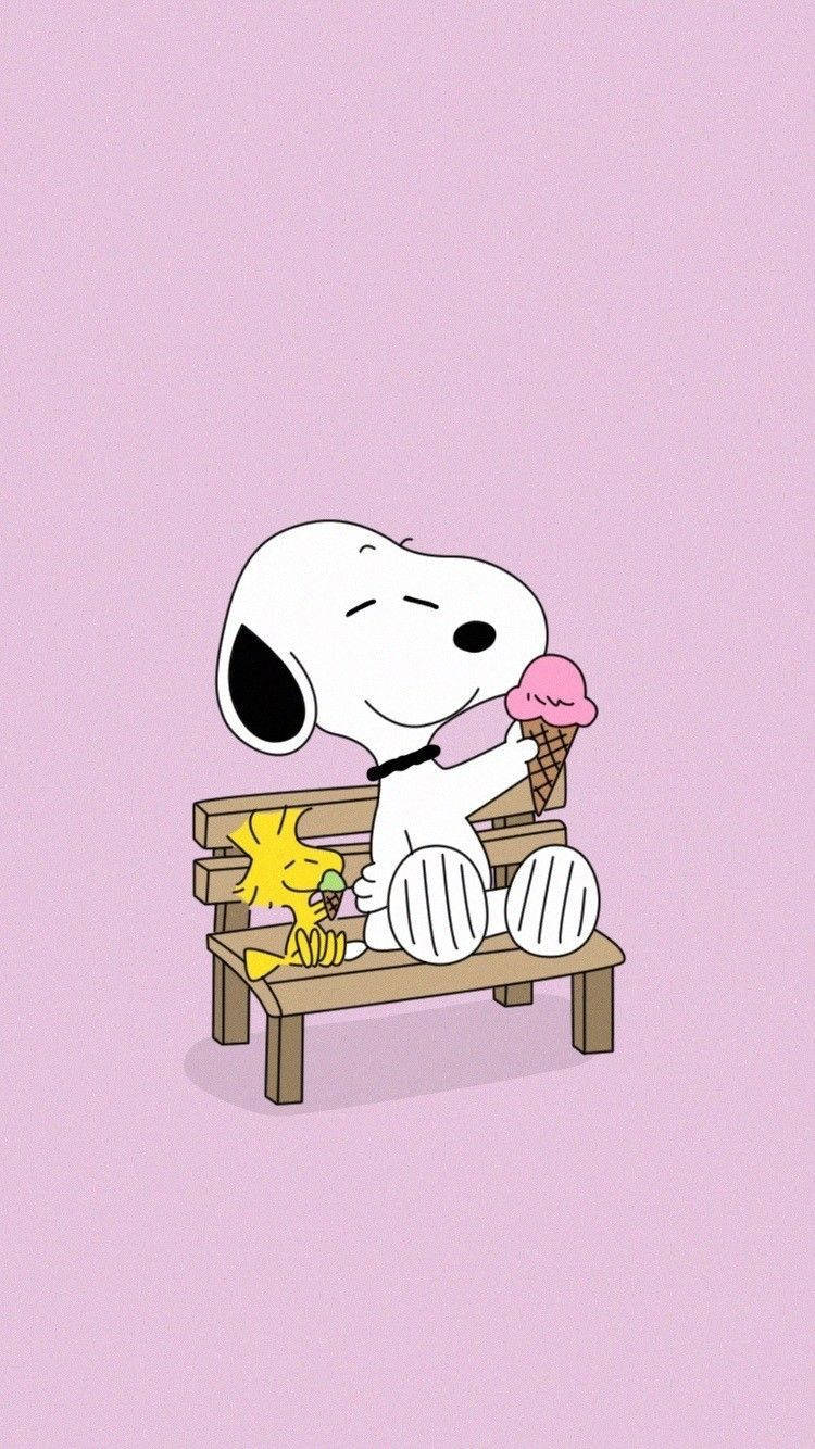 Snoopy And Woodstock Enjoying A Sweet Delight Wallpaper