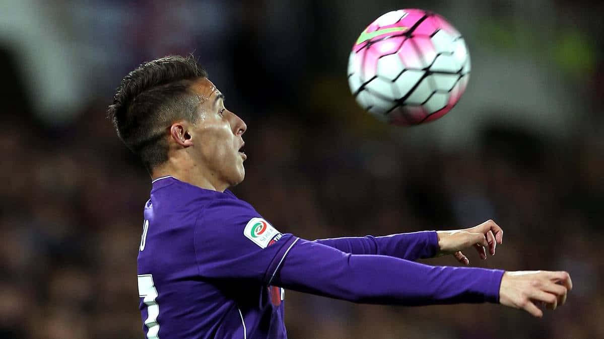 Soccer Player Heading Ball Wallpaper
